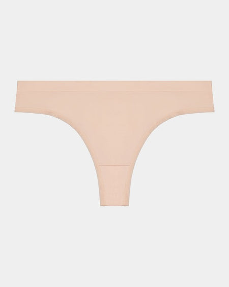 Seamless Thong in LATTE. Flat lay front view