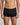 Model wears High Tech Cotton Mens Trunk in BLACK. On body front view
