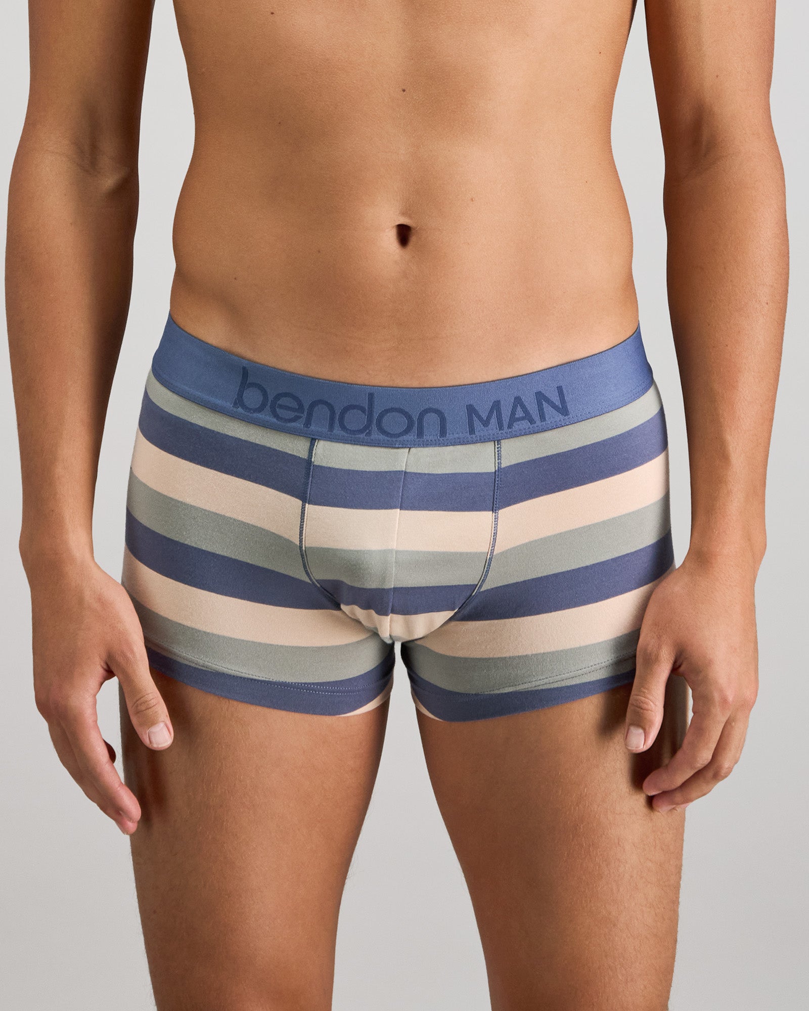 Model wears Rugby Stripe Mens Trunk in INDIGO/ICEBERG/SMOKE. On body front view