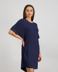 Model wears Belle Bamboo Nightie in NAVY BLAZER. On body side view