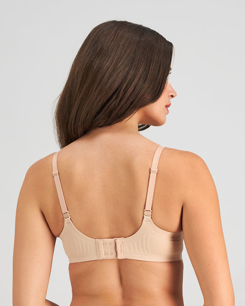 Model wears Comfit Collection Contour Bra in LATTE. On body back view