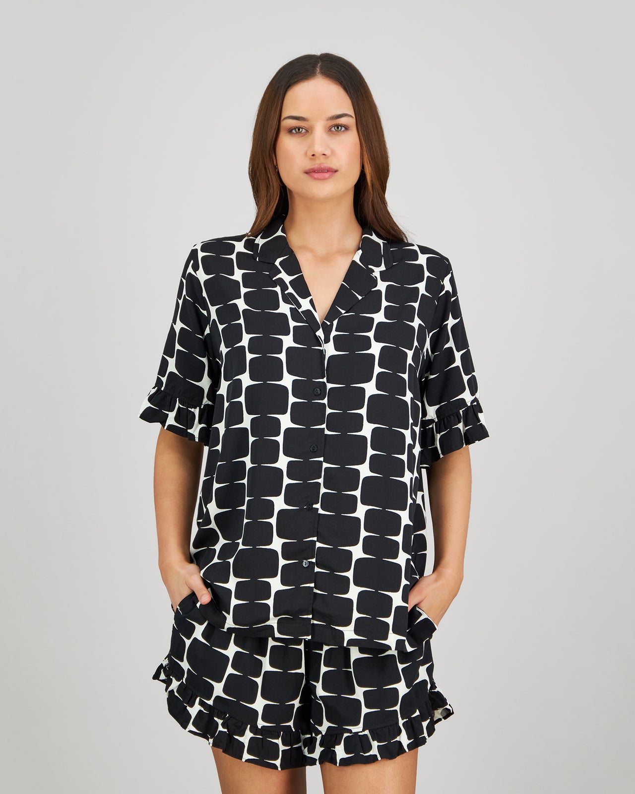 Model wears Audacious Dreams Short PJ in MINIMALIST PRINT. On body front view