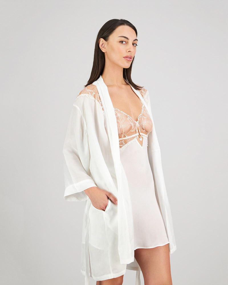 Model wears Eros Robe in SUGAR. On body side view