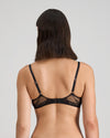 Model wears Niara Underwire Bra in BLACK/BEAUJOLAIS. On body back view