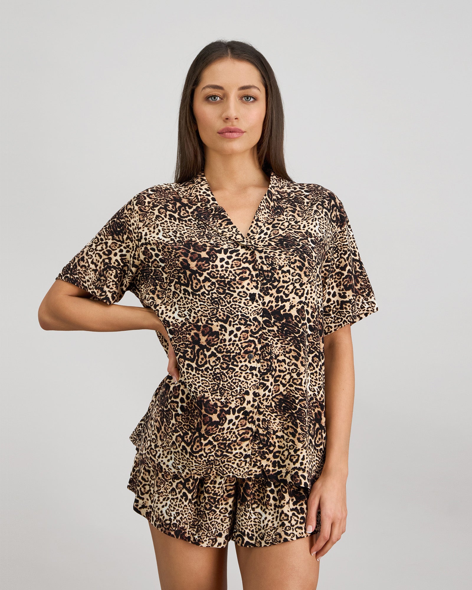 Model wears Dare To Dream Short Pj Set in WILD LYNX PRINT. On body front view