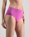 Model wears Seamless Soft Full Brief in RADIANT ORCHID. On body side view