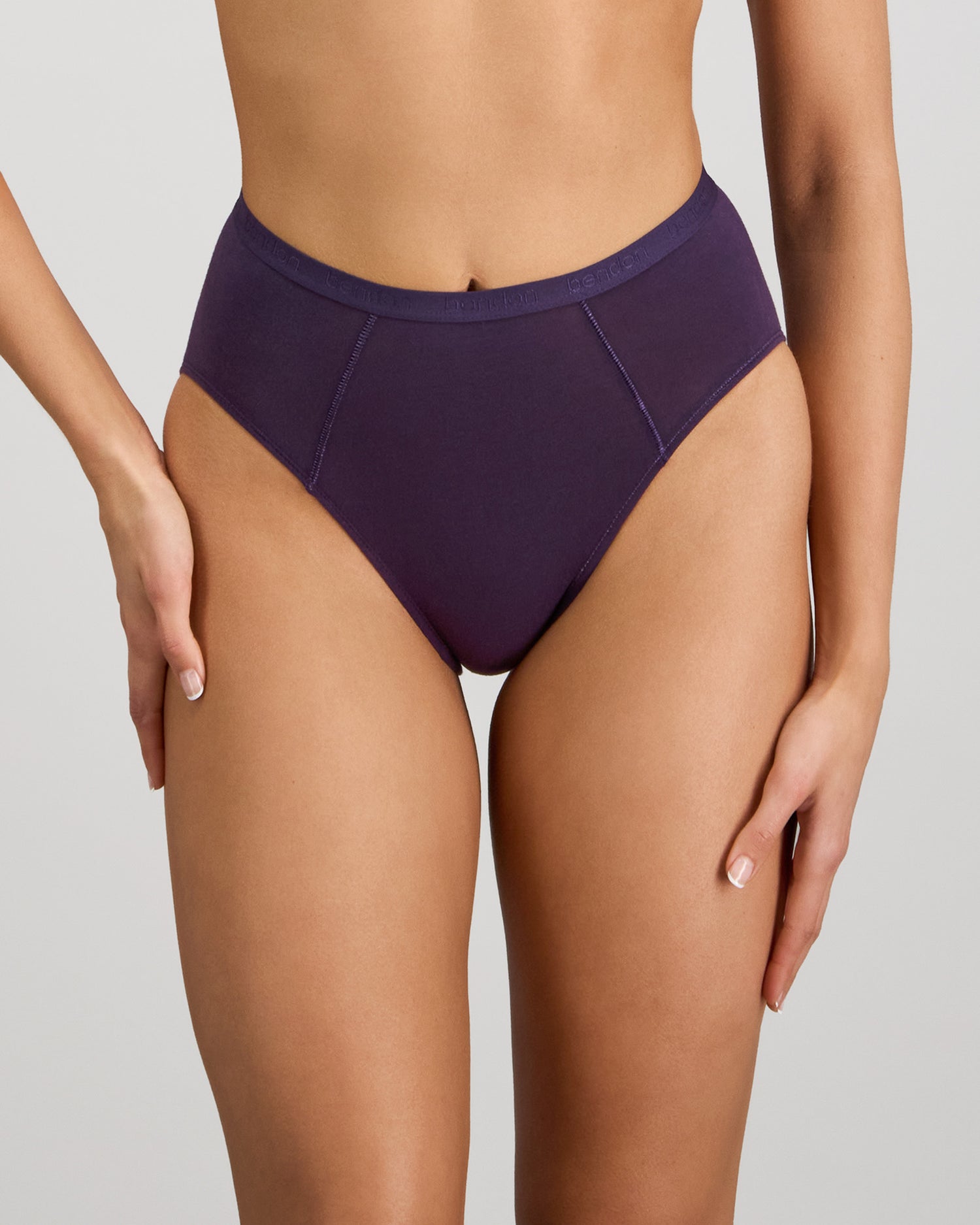 Model wears Body Cotton High Cut Brief in PURPLE VELVET. On body front view