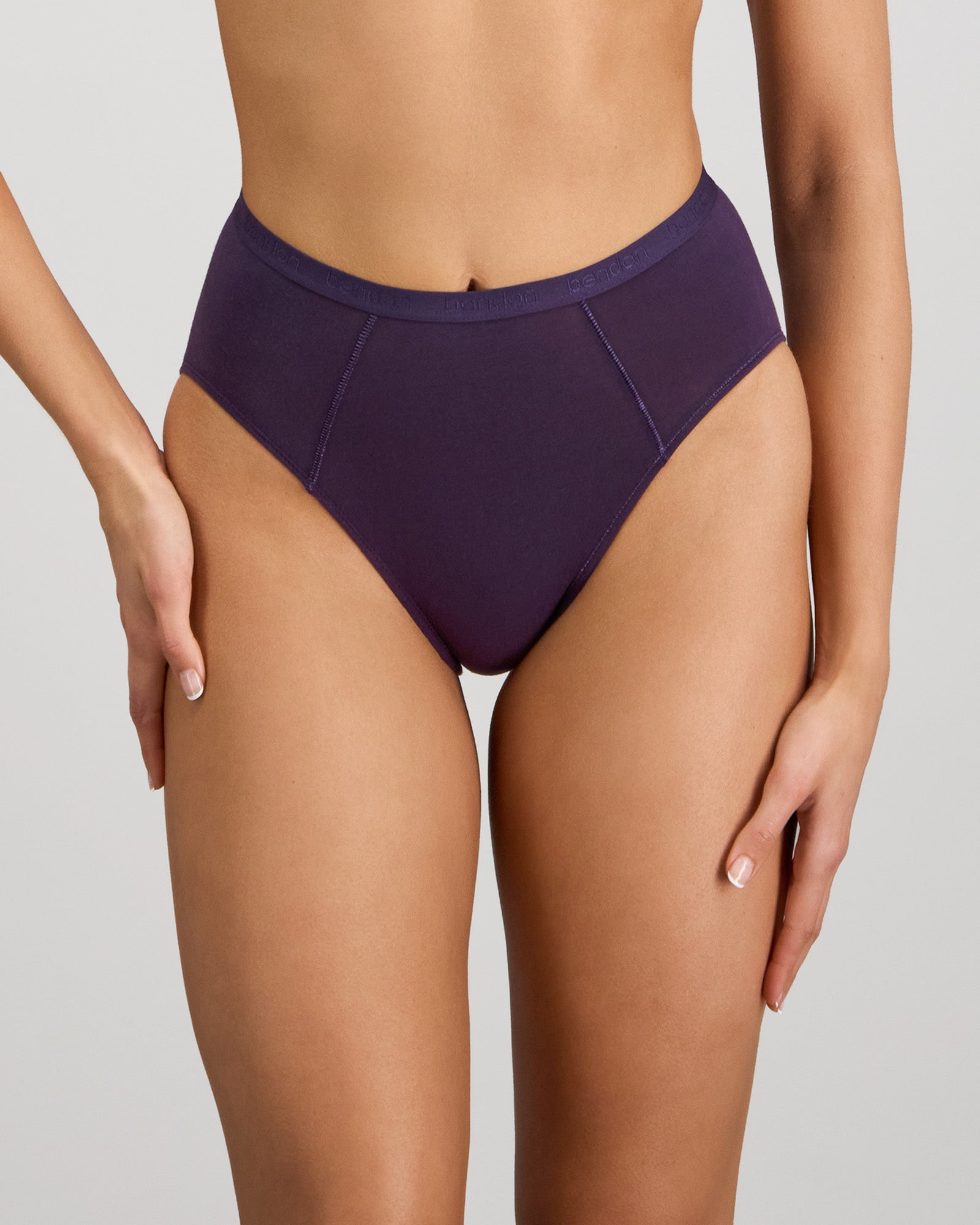 Model wears Body Cotton High Cut Brief in PURPLE VELVET. On body front view
