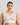 Model wears Midnight Express Wire Free Bra in EGRET. On body front view