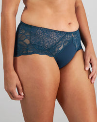 Model wears Midnight Express Full Brief in REFLECTING POND. On body side view