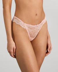 Model wears My Fit Lace Thong in EVENING SAND. On body side view