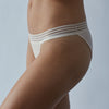 Model wears Stripe Elastic & Papertouch Tanga in SILVER PEONY. On body side view