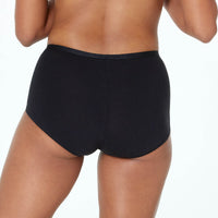 Model wears Body Cotton Full Brief in BLACK. On body back view