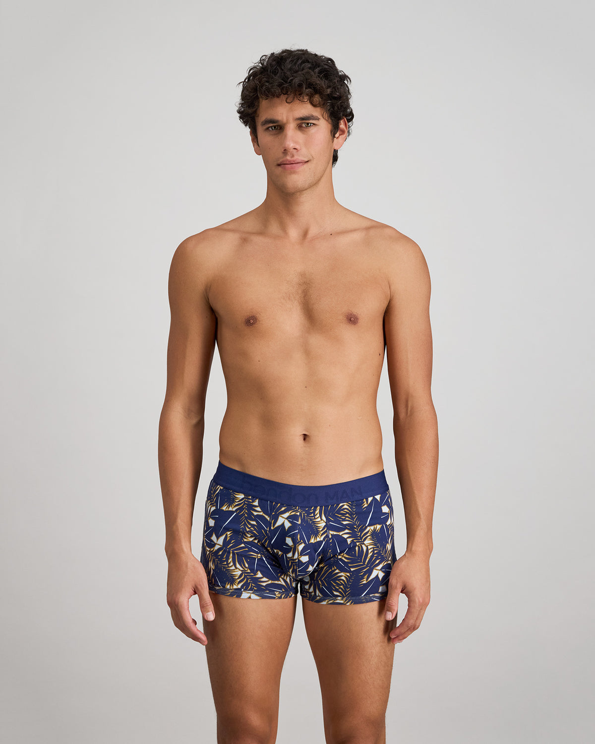 Retros Print Mens Trunk in GOLD TROPICAL PRINT. Feature shot