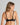 Model wears Kika Bohemia Underwire Bra in BLACK. On body back view