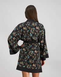 Model wears Lost Paradise Robe in BLACK PRINT. On body back view