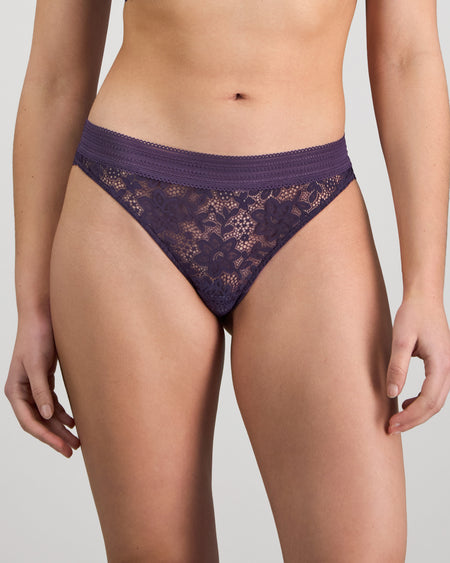 Model wears Jessie Thong in PURPLE VELVET. On body front view