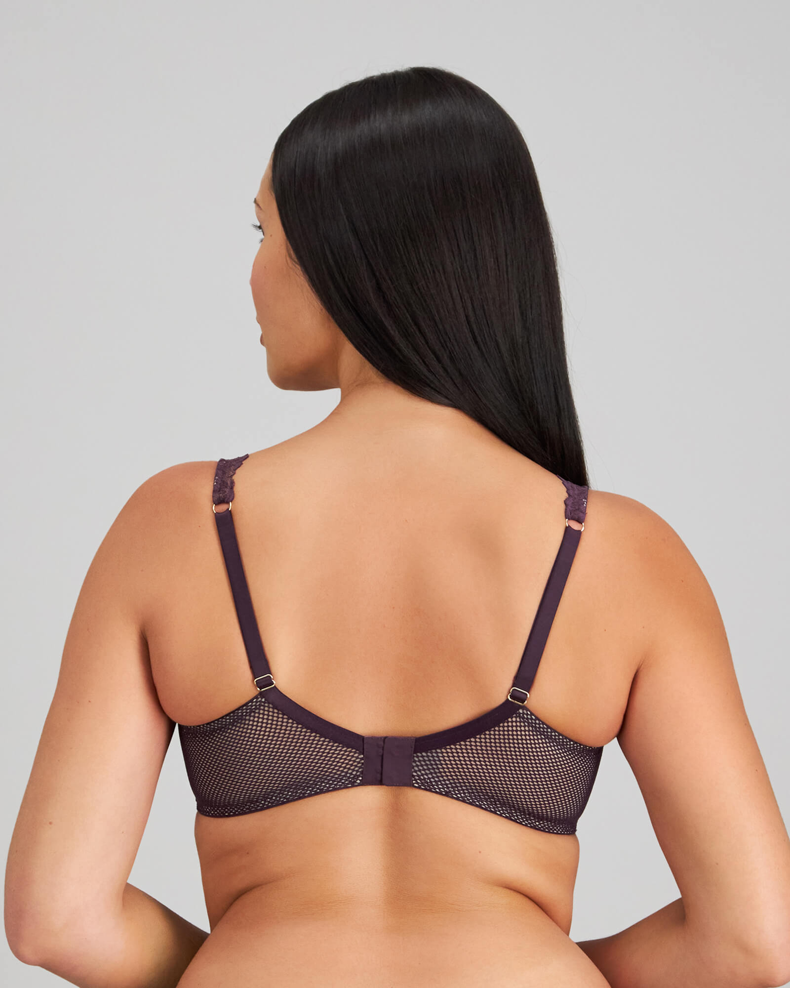 Model wears Nova Rosa Underwire Bra in PLUM PERFECT. On body back view