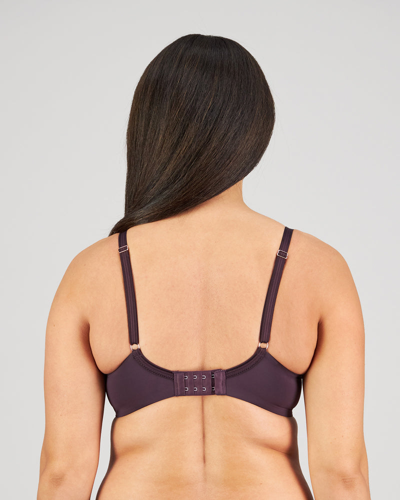 Model wears Sculpt Contour Bra in PLUM PERFECT. On body back view