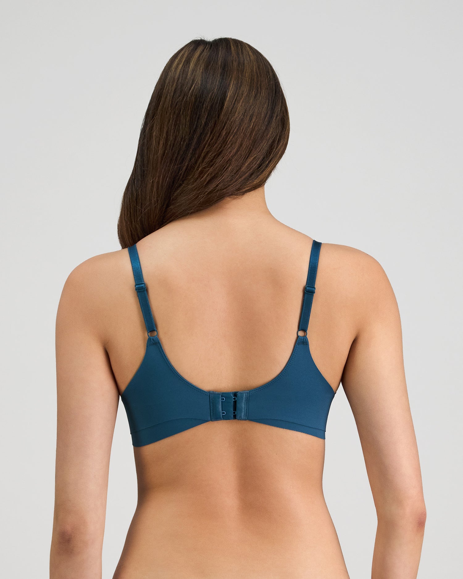 Model wears Flawless Form Contour Bra in MEDITERRANEA. On body back view