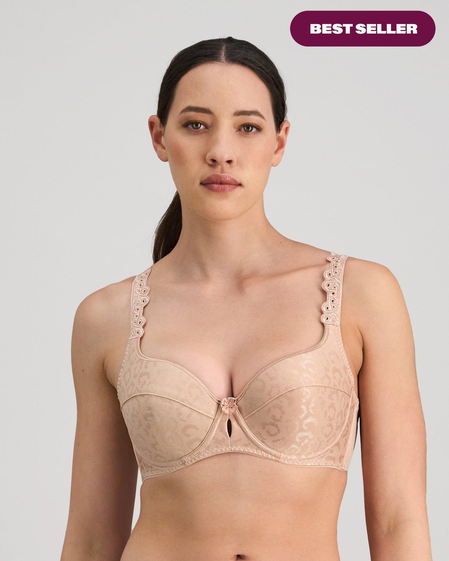 Model wears Damask Contour Bra in LATTE. On body front view