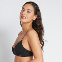 Model wears Hold Me Wire Free Bra in BLACK/NEON. On body side view