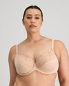 Model wears Coral Underwire Bra in LATTE. On body front view