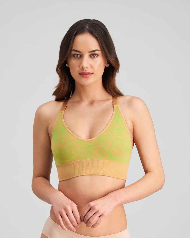 Model wears Inspiration Crop Top in LIME PUNCH LEOPARD PRINT. On body front view