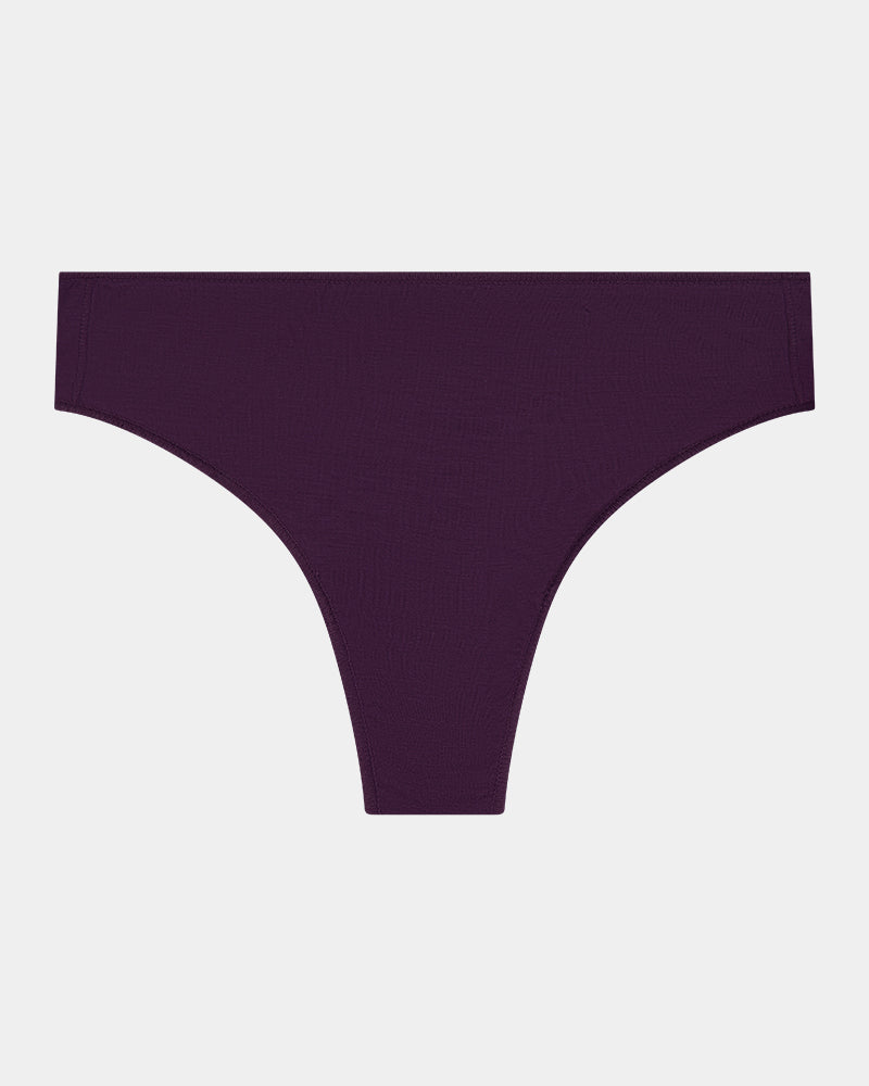 Au Naturel Thong in PLUM PERFECT. Flat lay front view