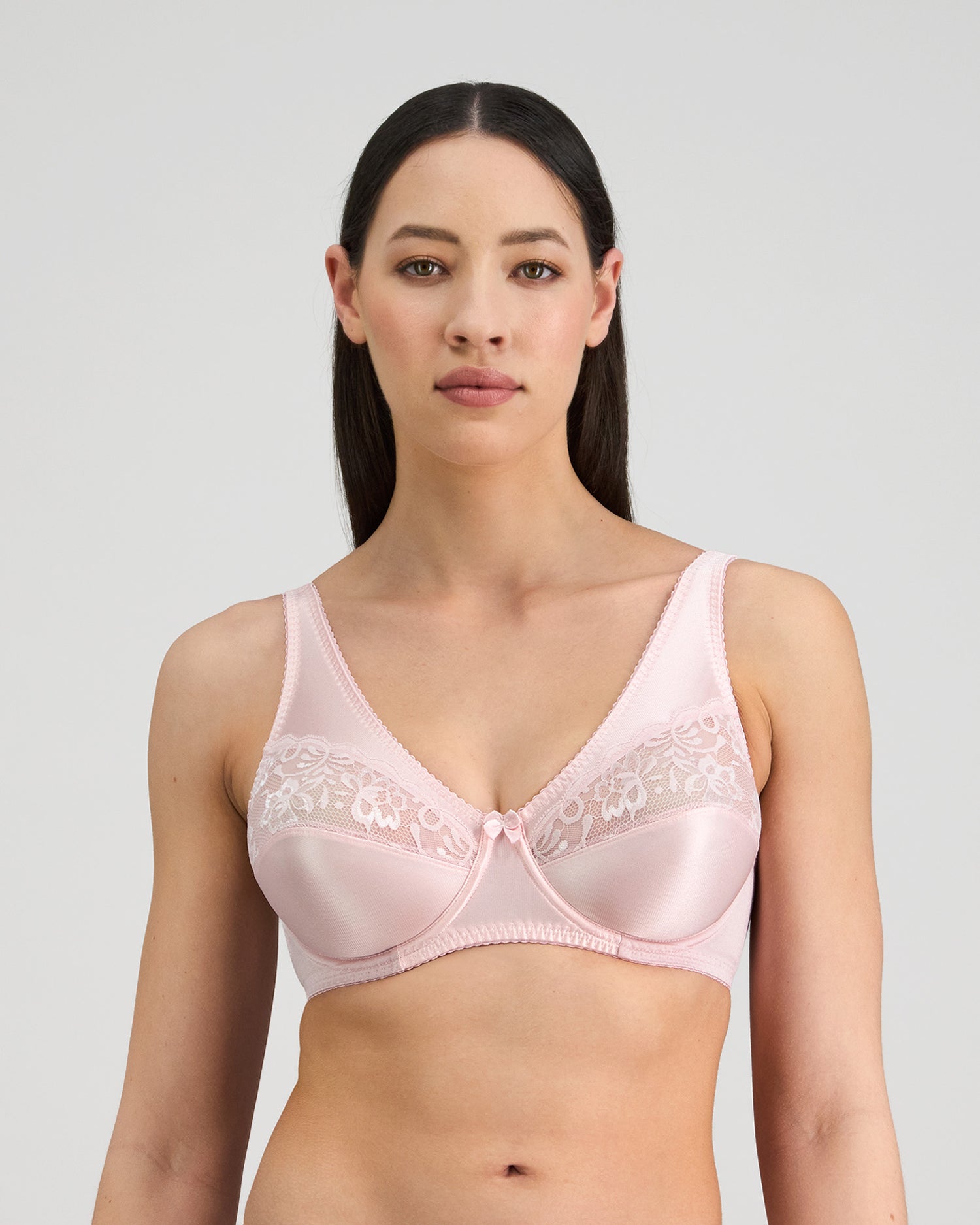 Model wears Classic Underwire Underwire Bra in PALE LILAC. On body front view