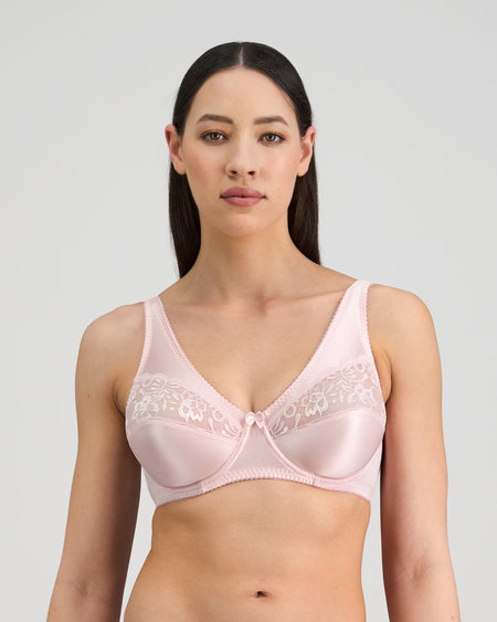 Model wears Classic Underwire Underwire Bra in PALE LILAC. On body front view