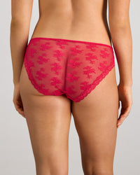 Model wears Light Lace Bikini in JAZZY. On body back view