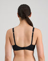 Model wears Rita Contour Bra in BLACK. On body back view
