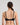 Model wears Rita Contour Bra in BLACK. On body back view