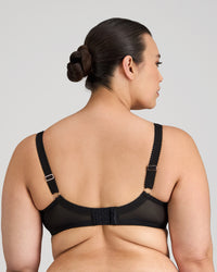 Model wears Faithful Underwire Bra in BLACK. On body side view