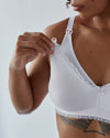 Model wears Elodie Maternity Bra in CRADLE PINK STRIPE. On body side view