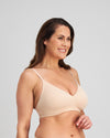Model wears Comfit Collection Wire Free Bra in LATTE. On body side view