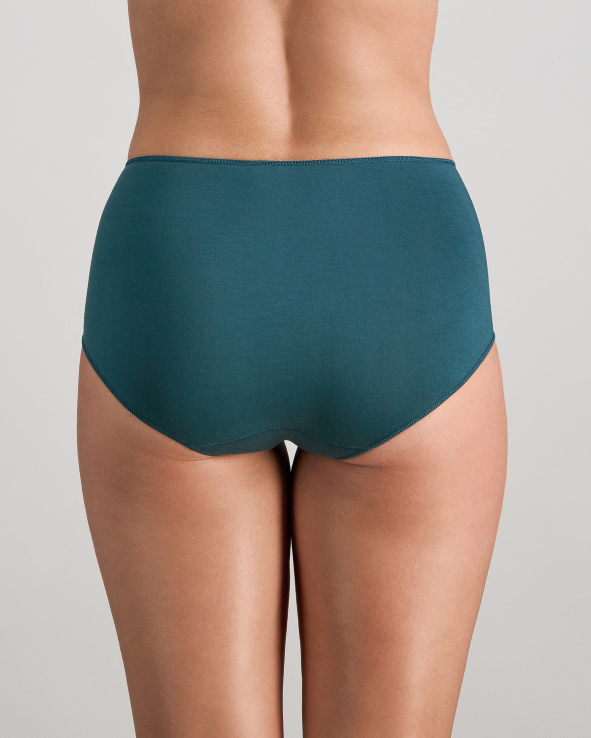 Model wears Au Naturel Full Brief in MEDITERRANEA. On body back view
