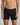 Model wears Bamboo Mens Trunk in BLACK. On body front view