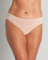Model wears Au Naturel High Cut Brief in LATTE. On body front view