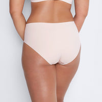 Model wears Smooth Revolution Full Brief in LATTE. On body back view