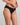 Model wears Play Bikini in BLACK. On body side view