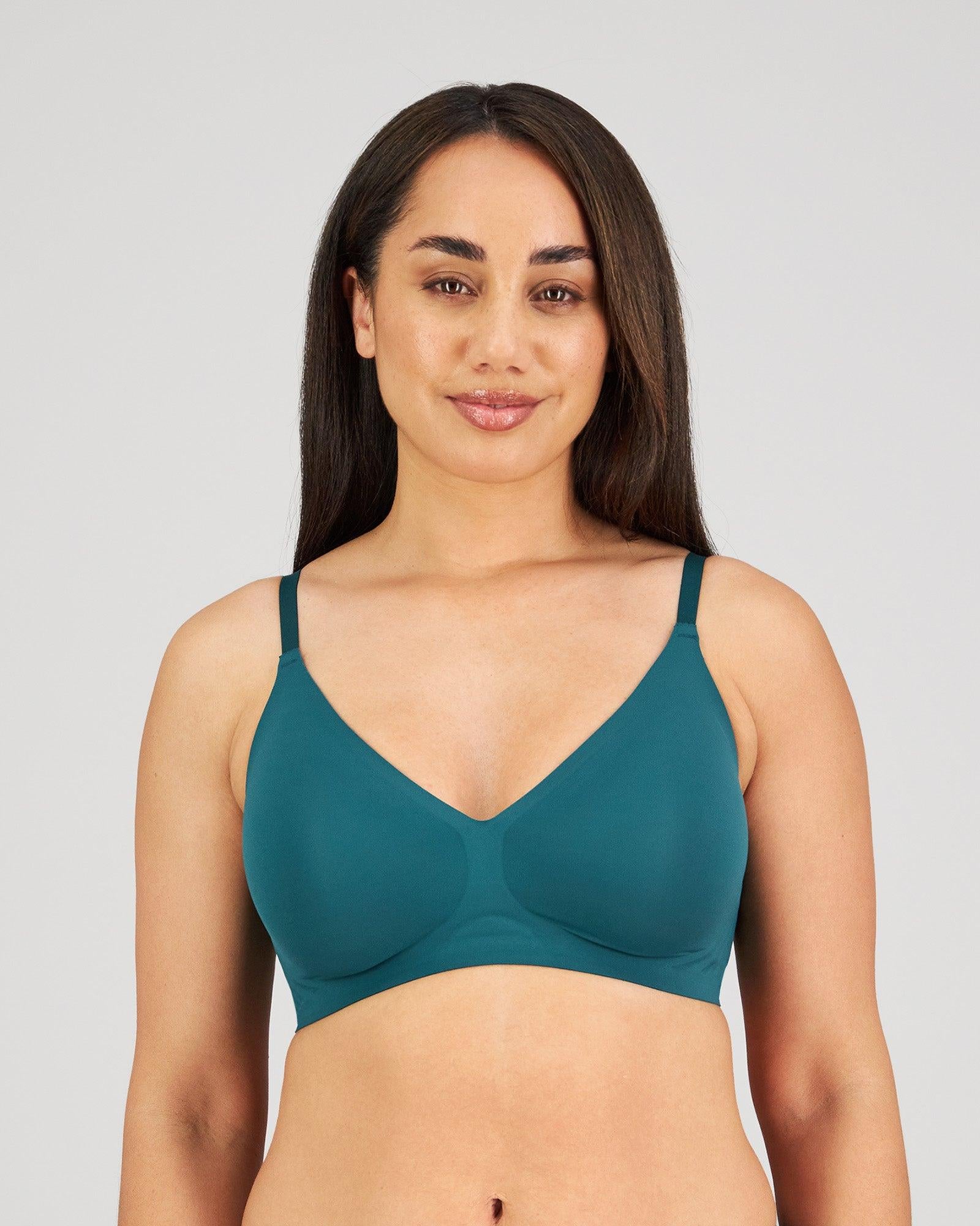 Model wears Comfit Collection Wire Free Bra in RAIN FOREST. On body front view