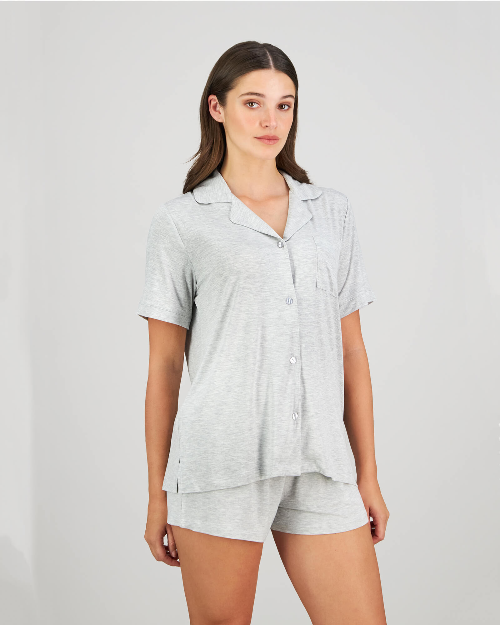 Model wears Belle Bamboo Short PJ in LIGHT GREY MARLE. On body side view
