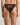 Model wears Midnight Magic Tanga in BLACK. On body back view