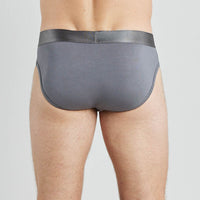 Model wears Bamboo Mens Brief in ASH. On body back view