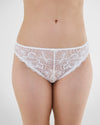 Model wears Embrace Bikini in WHITE. On body front view