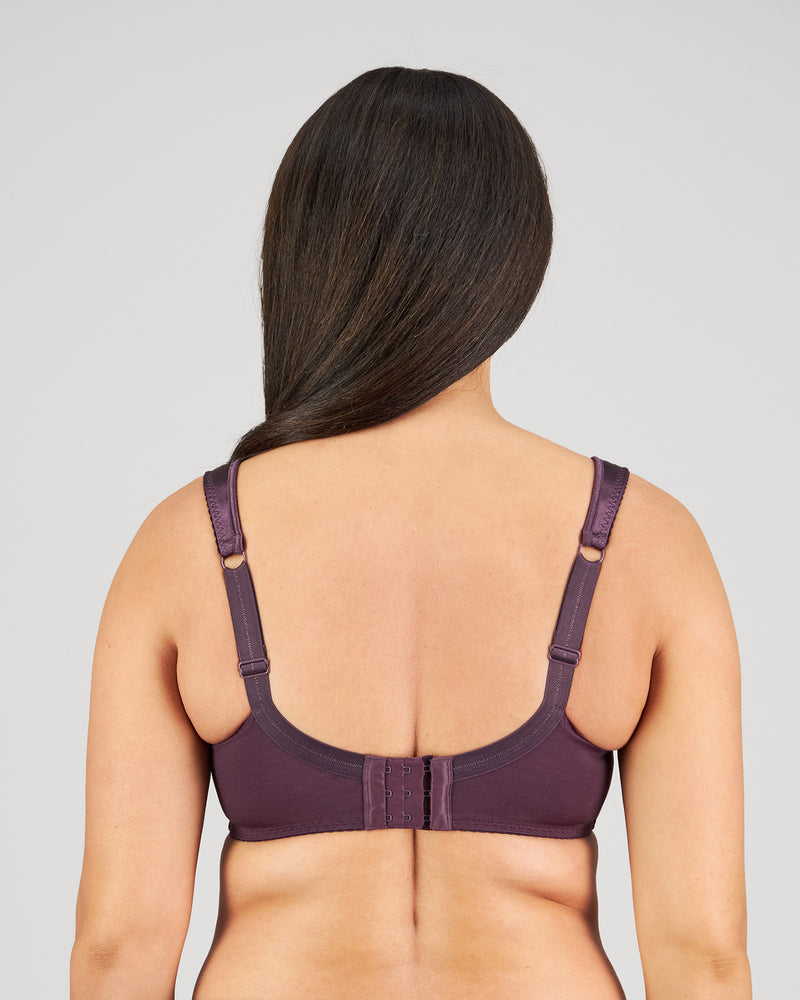 Model wears Charlotte Underwire Bra in PLUM PERFECT. On body back view