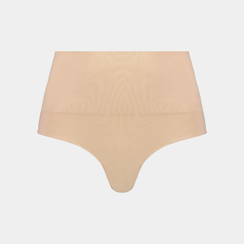 Medium Control Thong in CARAMEL. Flat lay front view
