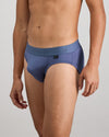 Model wears Bamboo Mens Brief in VINTAGE INDIGO. On body side view